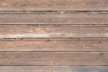 Fototapeta premium Wooden gray fence in the form of an abstract background