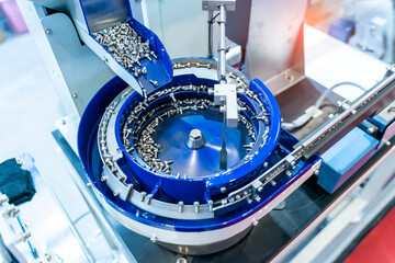 industrial machine robot in assembly line working in factory. Smart factory industry 4.0 concept.