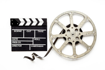 Movie film reel with clapperboard. Cinema concept - obrazy, fototapety, plakaty