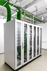 data servers with a lot of green cables