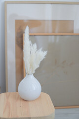 white vase with flower