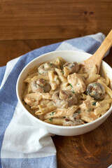 Pasta with mushrooms in a creamy sauce. Side view.