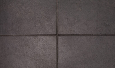 Background texture of textured square floor ceramic tiles