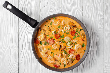seafood saute in a pan, top view