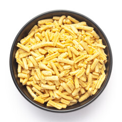 Close up of Ratlami Besan sev plane and salty Indian namkeen (snacks) on a ceramic black bowl. Top view