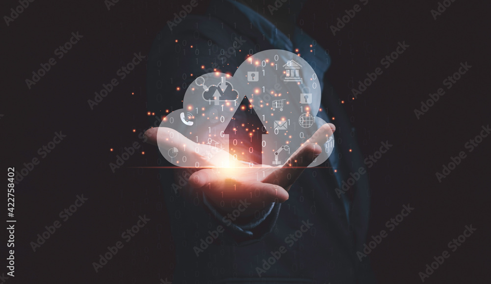 Poster businessman holding virtual cloud computer with icons for download and upload application, technolog
