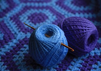 Plaid crocheted from blue and lilac threads