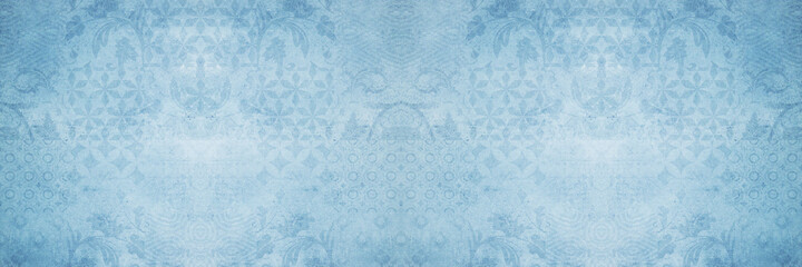 Old blue vintage shabby damask patchwork tiles stone concrete cement wall texture background banner	