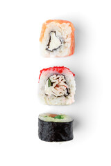 Three different sushi rolls isolated on white background.