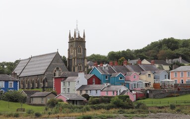 Fototapeta na wymiar Aberaeron Colorful Houses and Holy Trinity Church in Wales, UK