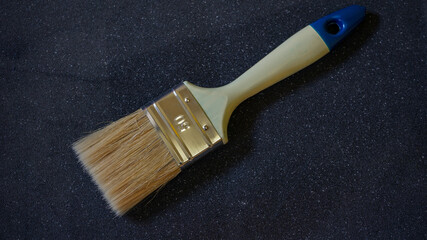 paint brush on wood background