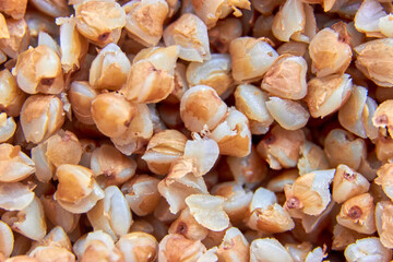 close-up of buckwheat porridge macro background. dietary nutrition