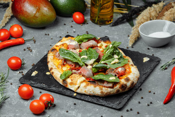 Meat Italian pizza with roast beef, steak slices, melted cheese, with olive slices and cheddar cheese. Close up, macro. Pizza time concept