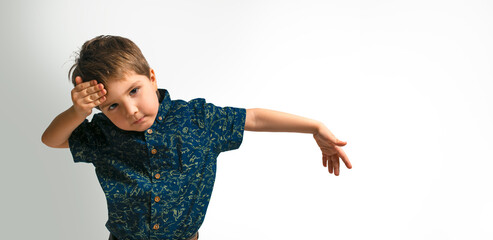 A little boy in a shirt. Studio shooting. Place for text