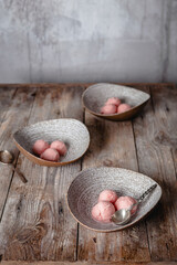 fresh orange ice cream scoops served in ceramic bowls on wooden table, copy space, seasonal dessert concept
