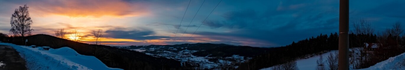 Fototapeta na wymiar High resolution stitched panorama of a beautiful winter sunset near Langfurth, Bavarian forest, Bavaria, Germany