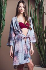Woman in pareo. Beachwear. Beautiful tender woman posing