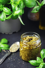 Homemade pesto in a glass jar