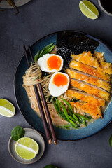 ramen soup with chicken, egg, and noodles