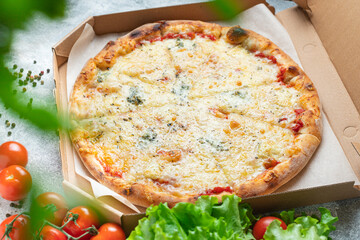 pizza cheesy 4 cheese fast food  assorted types portion on the table meal snack top view copy space food background