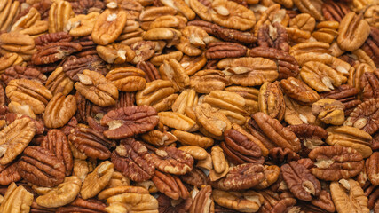 Tasty pecan-nut background. Top view.