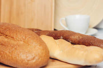 bread on a wooden table kitchen knife baking