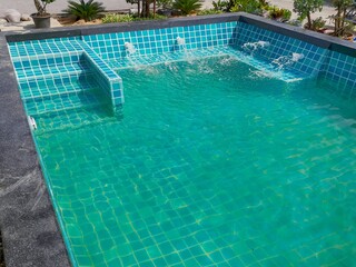 Beautiful swimming pool in the garden.Beautiful swimming pool design.