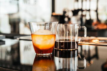 cold drip coffee in glass with ice ball