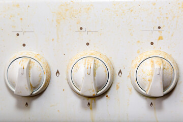 The rotary valve for turning on the gas in the kitchen is dirty from grease.