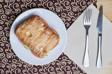 Breakfast sandwich with tomato and avocado