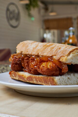 Breakfast sandwich with meat and onion