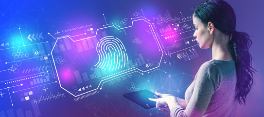Fingerprint scanning theme with woman using a tablet