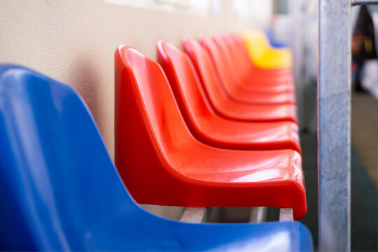 Closed empty seats on stadium due to pandemic of Coronavirus COVID-19 - Powered by Adobe