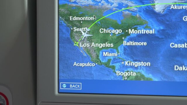 LCD monitor showing a map in the airplane in 4K
