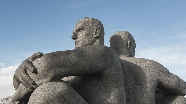 Granite Statute Of Two Men Sitting Back To Back By Gustav Vigeland As Part Of Vigeland Facility At Frogner Park, Oslo, Norway. - hyperlapse