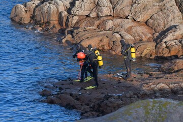 Scuba diving in the sea at Ploumanach in Brittany. France