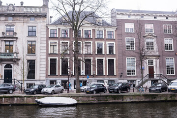  Along the canal walk citizens and moving vehicles