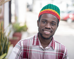 Young black man on city street , High quality photo