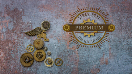 Label on the wall. Metal angel on grunge background