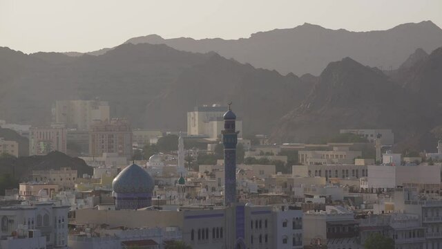 Waterfront Sultan Qaboos Grand Mosque In Muscat Old Town cityscape - Wide long shot