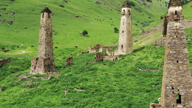 Aerial view of medieval tower complex in the mountains of Ingushetia, Russia, 4k