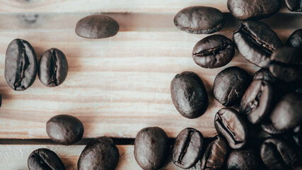 coffee beans on wooden background