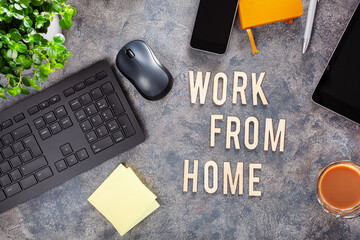 work from home text desk with keyboard computer smartphone notebook houseplants, workspace office at home