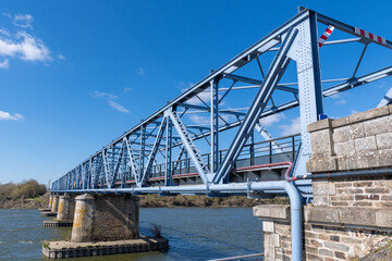 Blue steel old steel bridge on Loire river in France