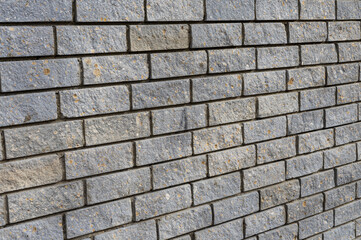 Background with a brick wall photographed at an angle