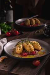 Traditional italian food culurgiones homemade pasta with potato on a plate