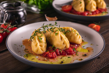 Traditional italian food culurgiones homemade pasta with potato on a plate
