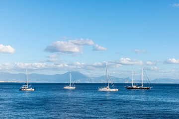 Sailboats and catamarans on the bay of Naples, Italy