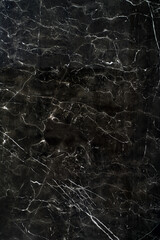 Ceramic porcelain stoneware tile texture or pattern. Natural stone black color with veining