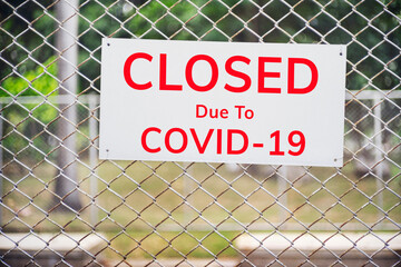 closed sign outside a restaurant, store, office or other outdoor